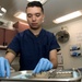 Nimitz Sailors Prepares Dental Examination Room