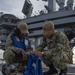 Nimitz Sailors Inspect Float Coat
