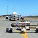 VP-4 Ordnance team Loads Torpedo