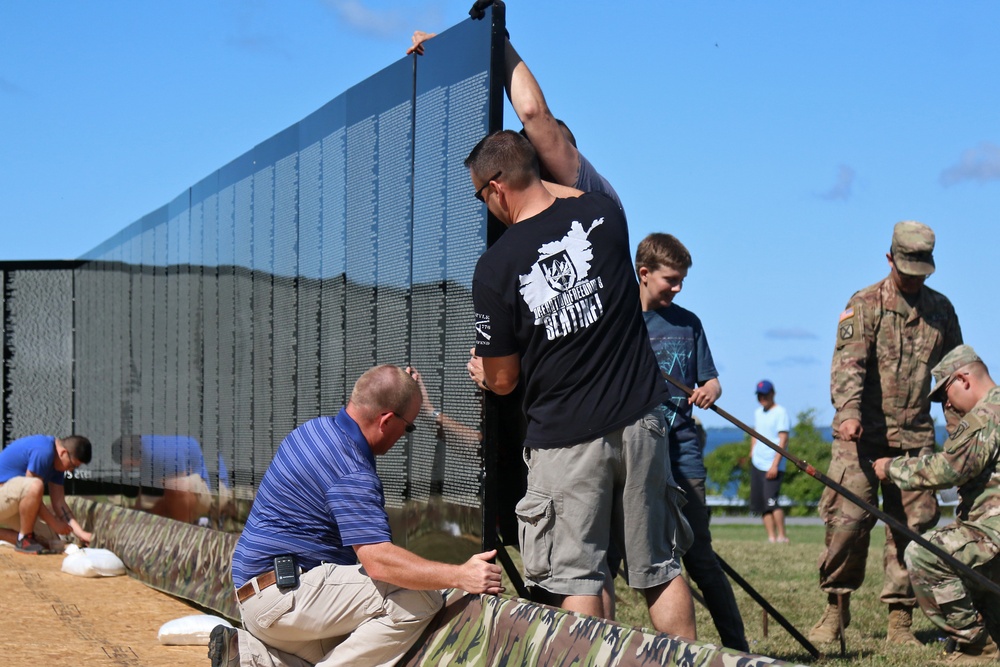 Engineer Soldiers set up moving Vietnam wall