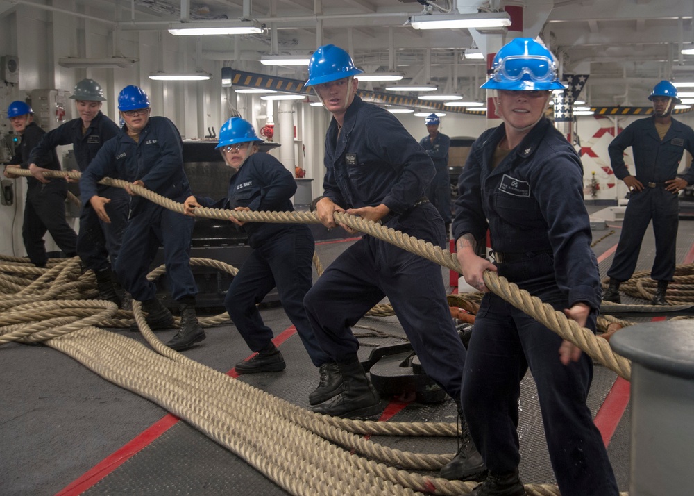 USS Makin Island Sailors Handle Lines