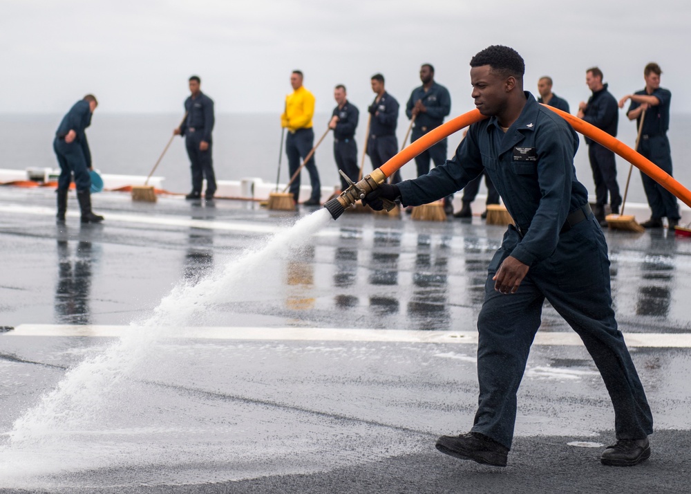 USS Makin Island Sailors Wash Down the Flight Deck
