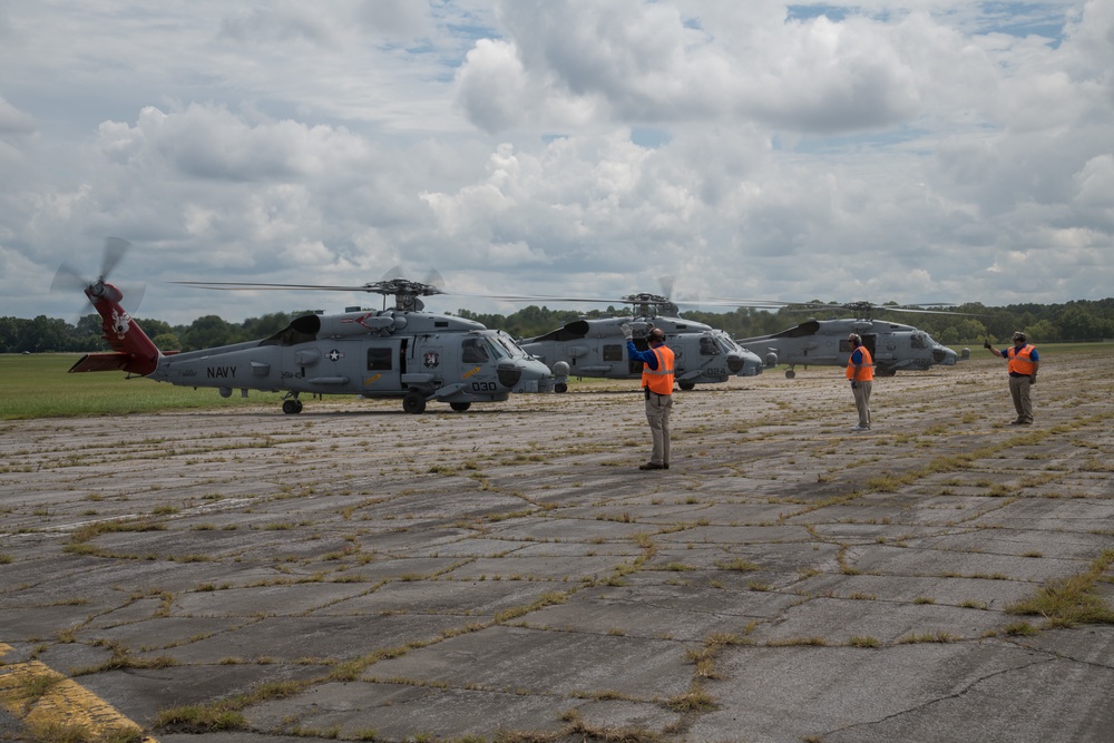 Maxwell AFB receives Navy MH-60R helicopters from Naval Air Station Jacksonville and Naval Station Mayport in advance of Hurricane Dorian