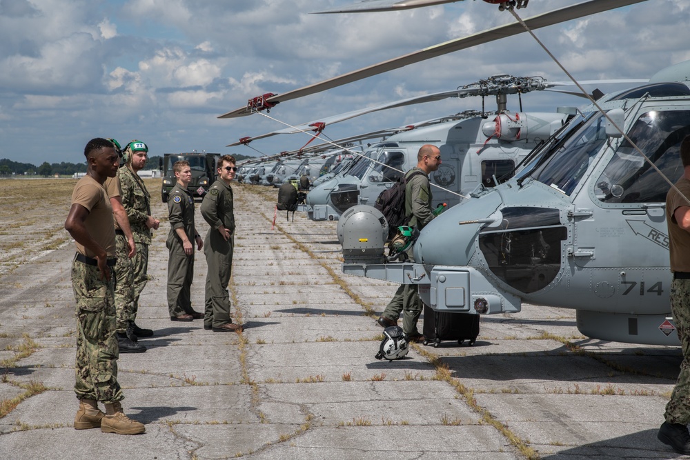 Maxwell AFB receives Navy MH-60R helicopters from Naval Air Station Jacksonville and Naval Station Mayport in advance of Hurricane Dorian