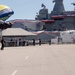 U.S. Navy Parachute Team, Leap Frogs, lands in front of the Battleship USS Iowa Museum