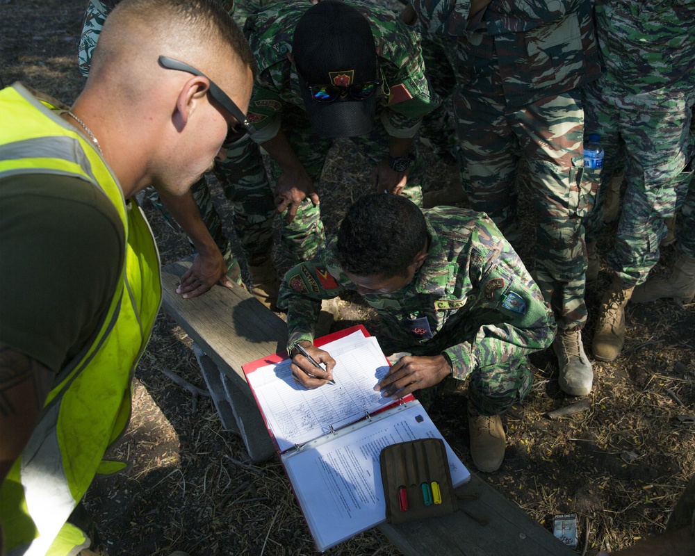 Timor-Leste Defense Force soldiers clear a grenade range during Hari'i Hamutuk 2019