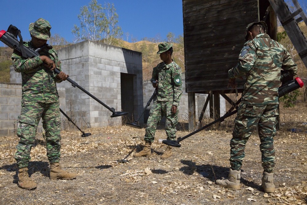 Timor-Leste Defense Force soldiers clear a grenade range during Hari'i Hamutuk 2019