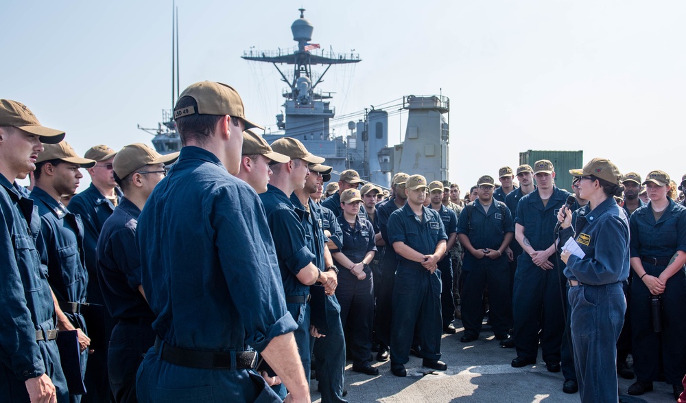 All Hands Call Aboard USS Harpers Ferry