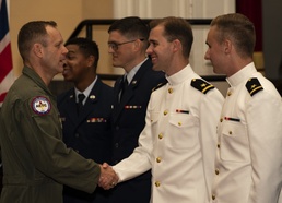 Brigadier General Congratulates First Navy Graduates from USAF Pilot Training Next Program