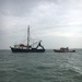 Mexican fishing vessels seek safe harbor ahead of Tropical Storm Fernand near Brownsville, Texas