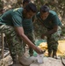 Timor-Leste Defense Force soldiers test potable water during Hari'i Hamutuk 2019