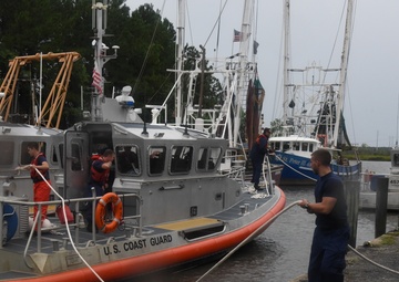Crewmembers from Coast Guard Stations Charleston and Georgetown secure a 45-foot response boat