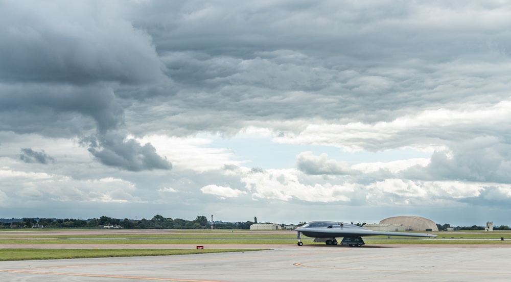 A B-2 Spirit Stealth Bomber from Whiteman AFB taxis down a runway at RAF Fairford