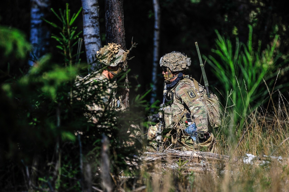 Sky Soldiers Communicate in Wood Line