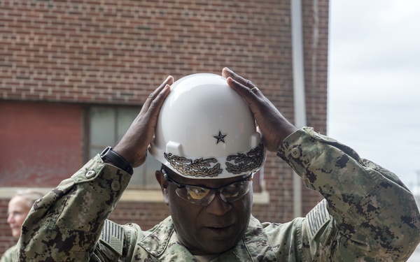 Rear Admiral Evans Dons Hardhat