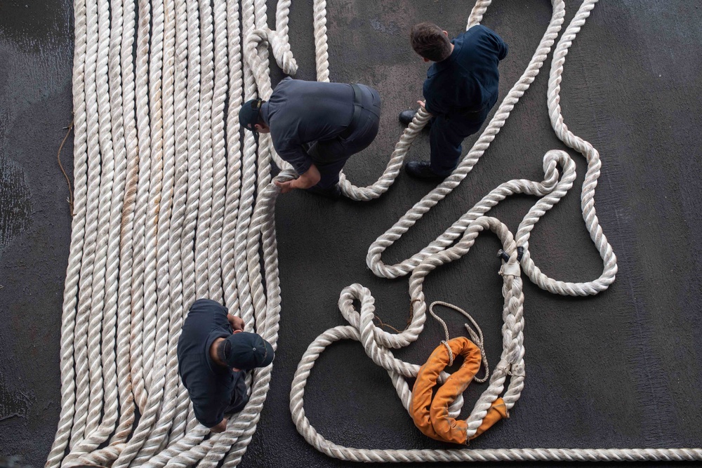 U.S. Sailors fake down line