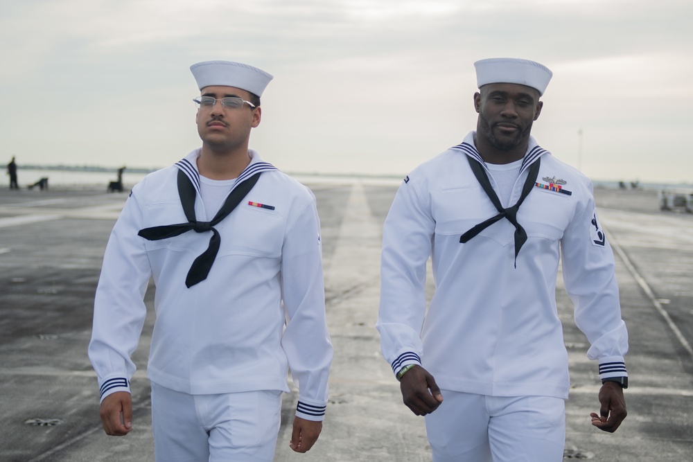 DVIDS - Images - U.S. Navy Sailors march across the flight deck of the ...