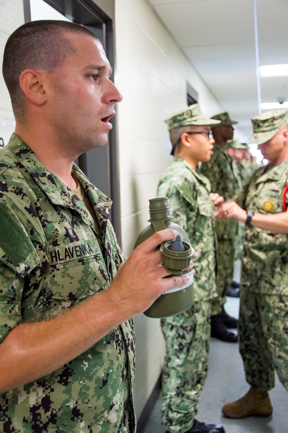 Recruit Division Commanders here at Officer Training Command in Newport, Rhode Island (OTCN) inspects uniforms as part of the Room, Locker and Personnel (RLP) inspection for Officer Candidate School (OCS) class 02-20 on Sept. 5, 2019.