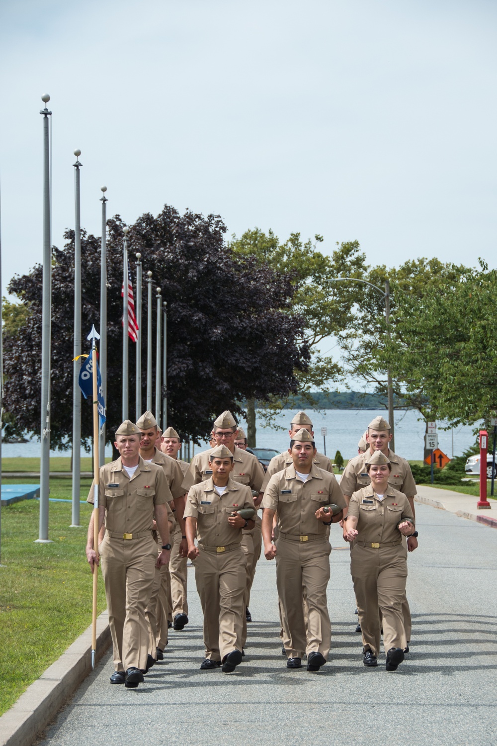 190905-N-TE695-0014 NEWPORT, R.I. (Sept. 5, 2019) – Echo company from Officer Candidate School (OCS) class 17-19 here at Officer Training Command, Newport, Rhode Island, (OTCN) marches to class after a short lunch break on Sept. 5, 2019.