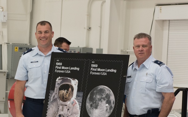 Local postmasters unveil USPS 1969 First Moon Landing Stamps during ceremony on Joint Base Cape Cod