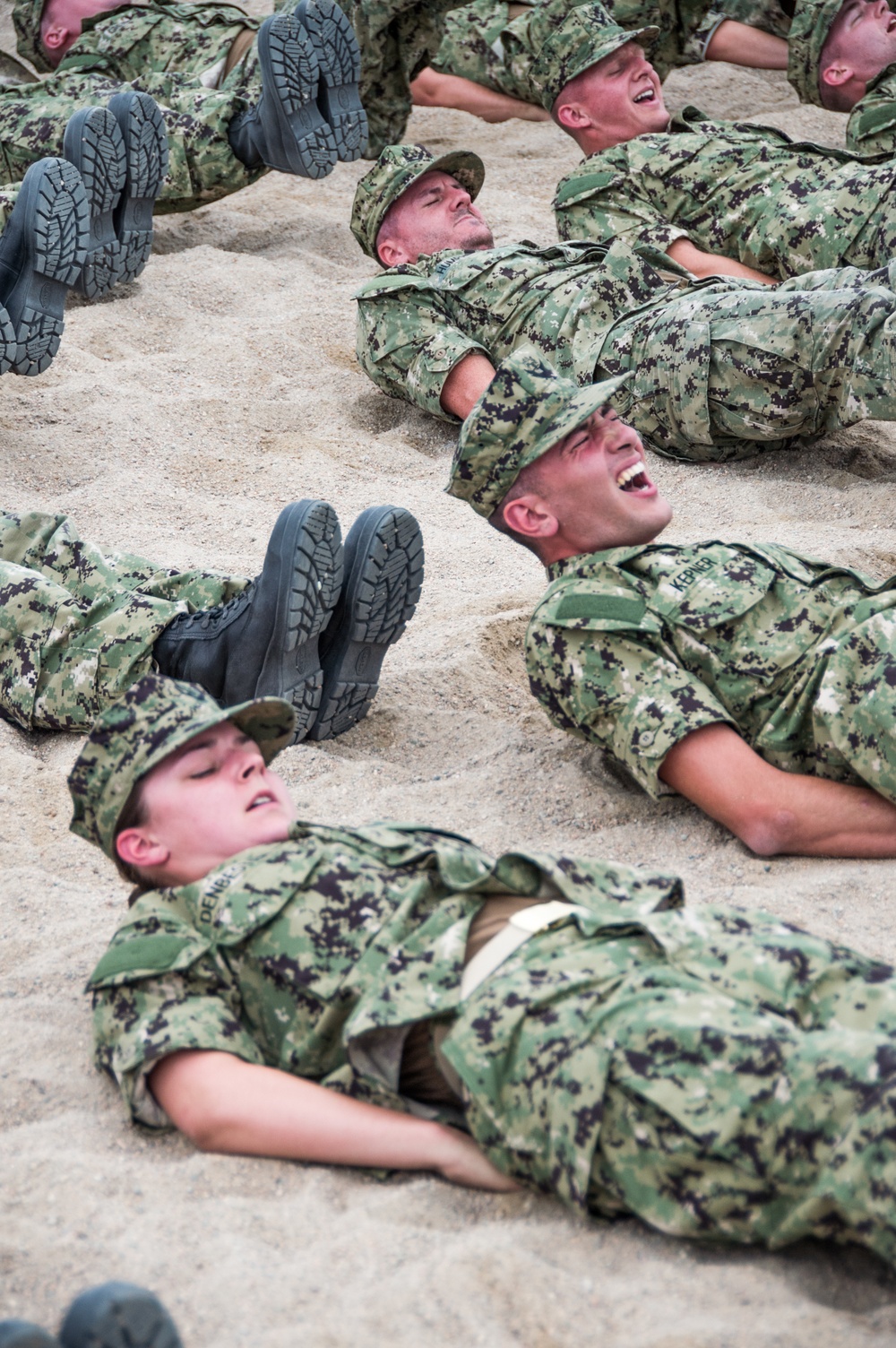 A Marine Corps Drill Instructor, assigned to Officer Training Command, Newport, Rhode Island, (OTCN) leads physical training for Officer Candidate School (OCS) class 02-20 prior to reaching their milestone as junior candidate officers on Sept. 6, 2019.