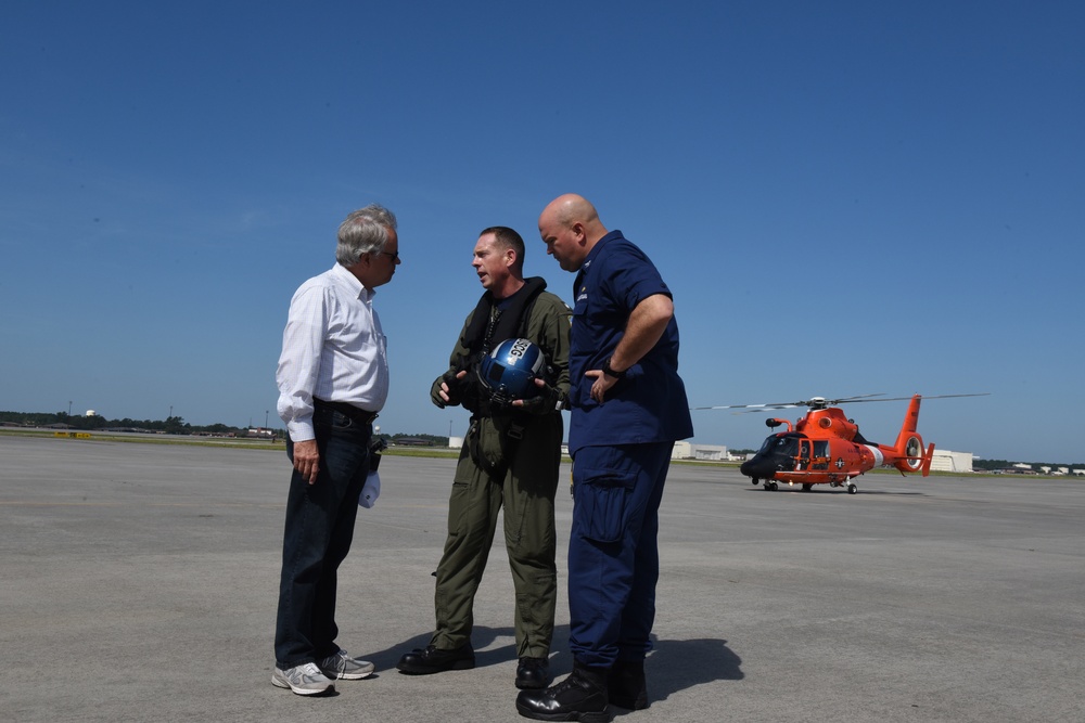 John Tecklenburg, mayor of Charleston meets with Cmdr. Brian Erikson, Air Station Savannah commander and Capt. John Reed, Sector Charleston commander