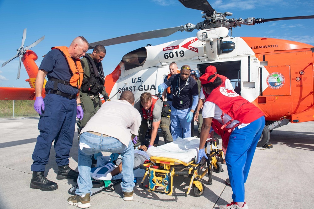 U.S. Navy and Coast Guard Transport Dorian Victims