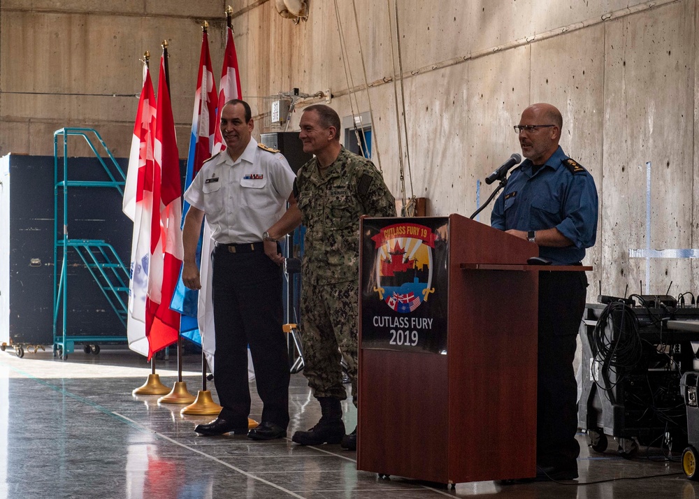 U.S. and Royal Canadian Navy Leadership Speak During a Conference