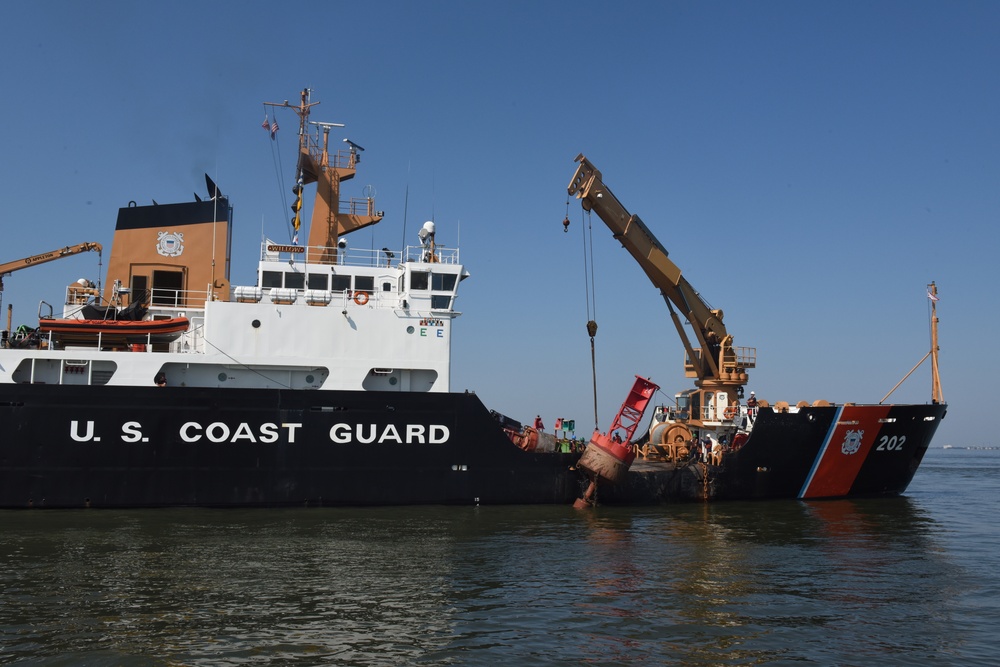 The Coast Guard Cutter Willow resets a buoy in Charleston Harbor