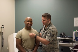 Cardiopulmonary Lab Technician checks Airman's heart.