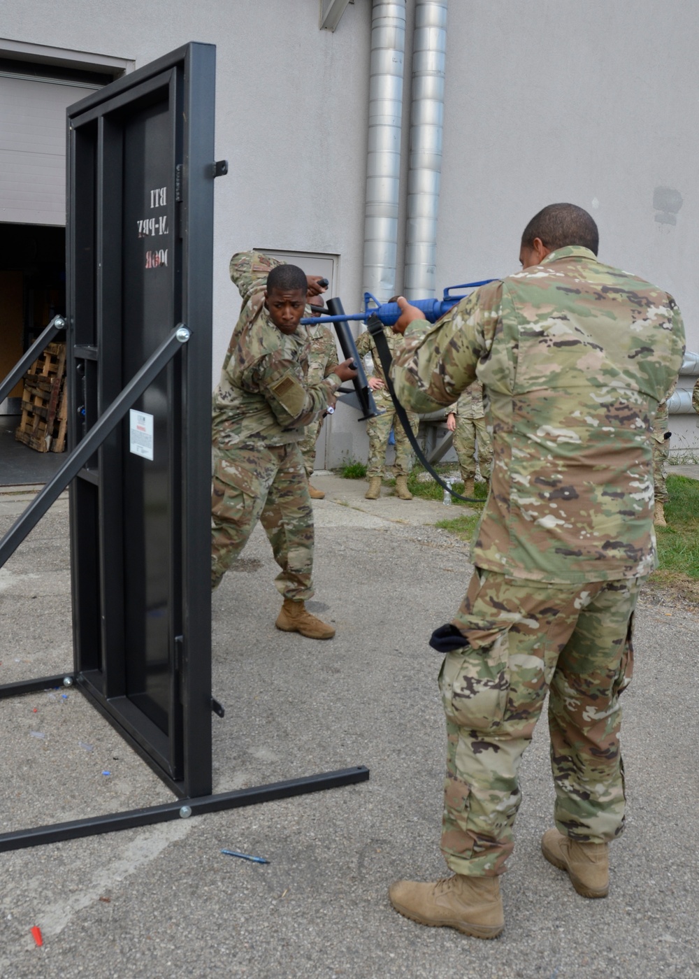 Security Forces Airmen train with specialized tools to force entry