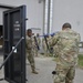 Security Forces Airmen train with specialized tools to force entry