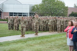 Members of the 155th ARW salute in formation during the "Welcome Home" ceremony