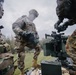 Paratroopers reload weapon