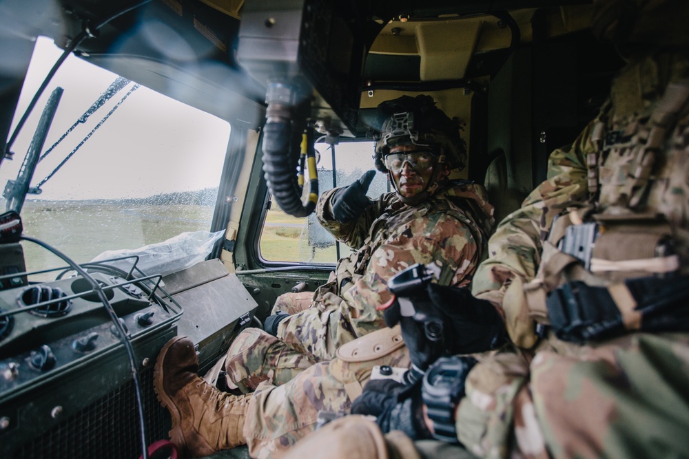 Paratroopers fire weapon
