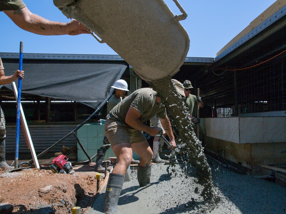 Service members build a walkway for a mess hall during Hari'i Hamutuk 2019