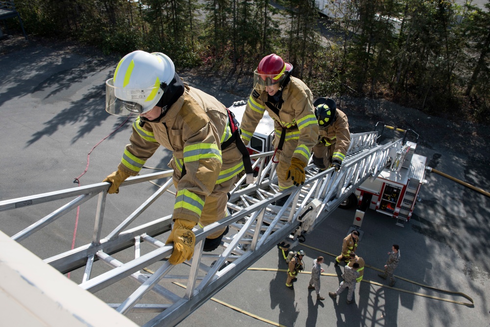 CE Airmen demonstrate fire protection capabilities at JBER