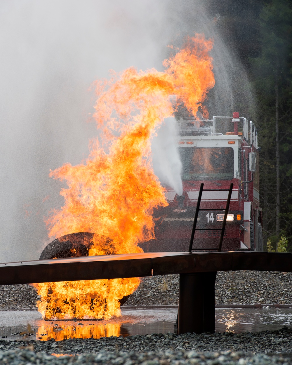 CE Airmen demonstrate fire protection capabilities at JBER