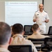 190910-N-TE695-0001 NEWPORT, R.I. (Sept. 10, 2019) – Officer Candidate School (OCS) class 17-19 here at Officer Training Command, Newport, Rhode Island, (OTCN) conduct student-led presentations about U.S. Naval history on Sept. 10, 2019.