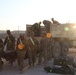 Lancer Soldiers unload equipment to start constructing the command post