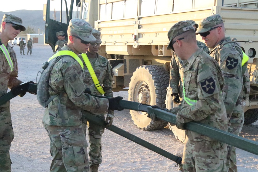 Lancer Soldiers build command post during NTC