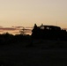 Lancer Soldier watches sunset at NTC