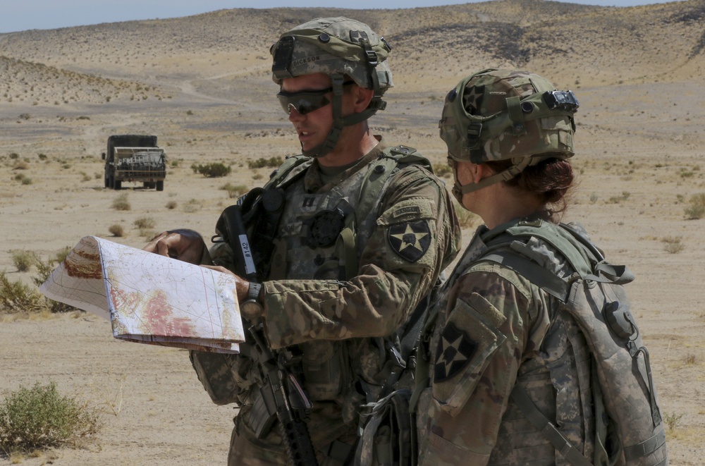 Cpt. Thomas Dickson reviews map at NTC