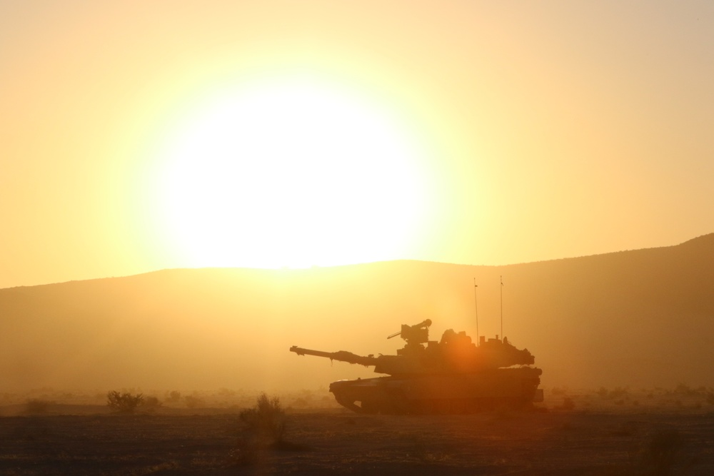 Abrams tank provides security for Lancer Brigade at NTC