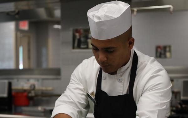Sgt. Caesar Nunez prepares fruit