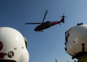 Cal Guard shuttles hand crews to the South Fire