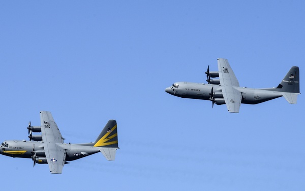 C-130H and C-130J fly in formation