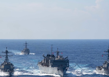 U.S. Navy ships conduct a refeuling-at-sea