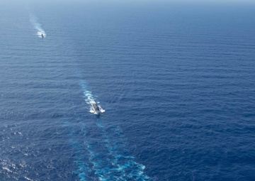 U.S. Navy ships conduct a refeuling-at-sea