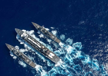 U.S. Navy ships conduct a refeuling-at-sea
